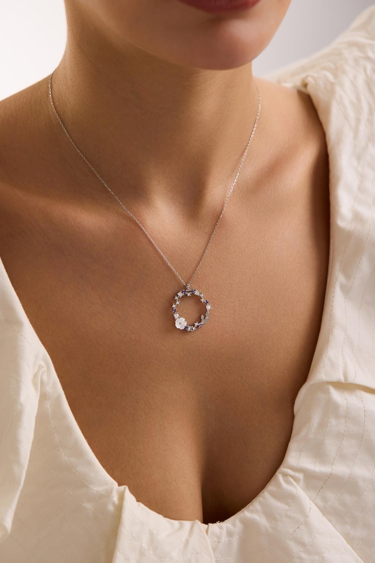 Rhodium Magnolia Necklace | Sterling Silver Circle Pendant | Zircon Jewelry